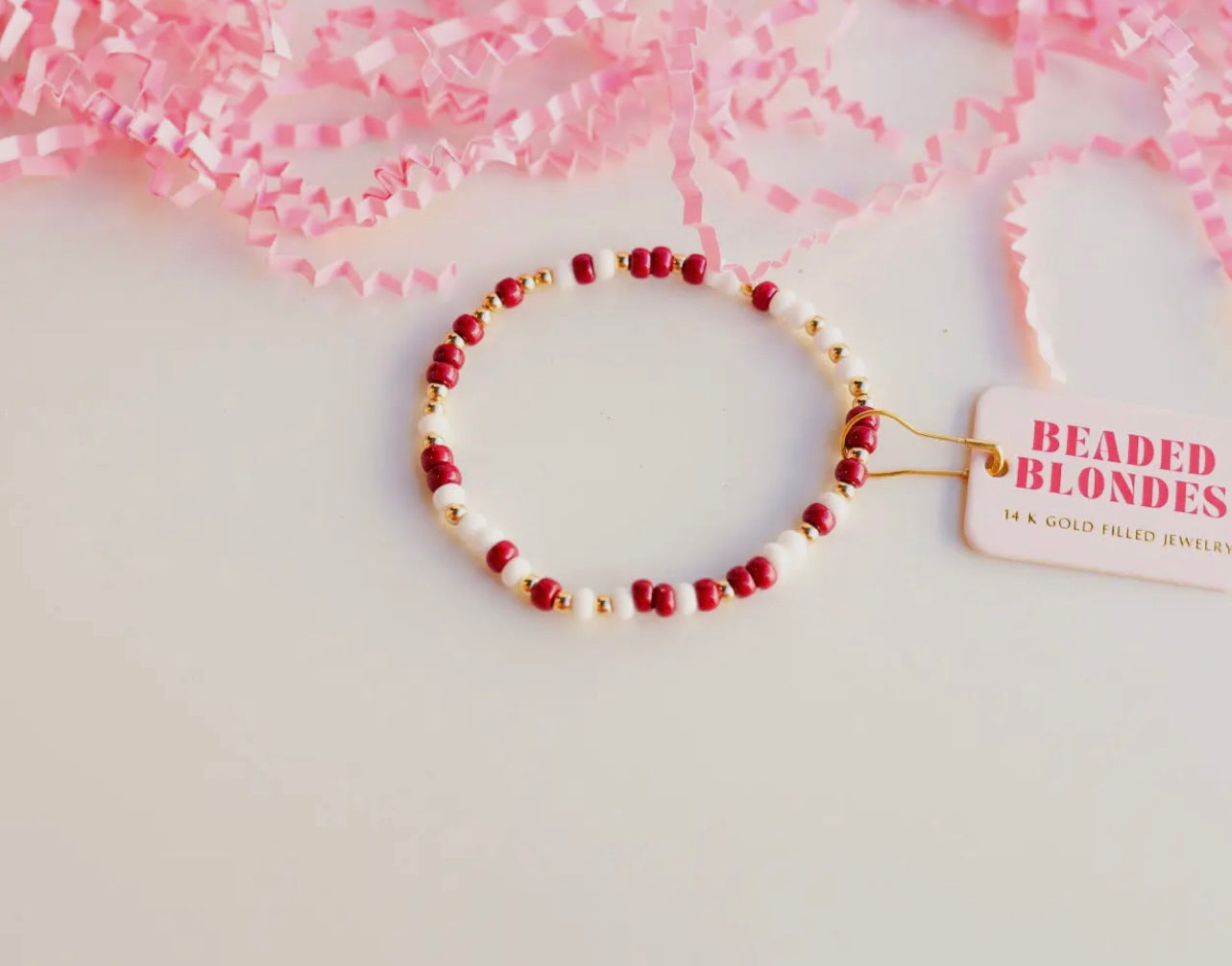 Burgundy and white beaded blonde