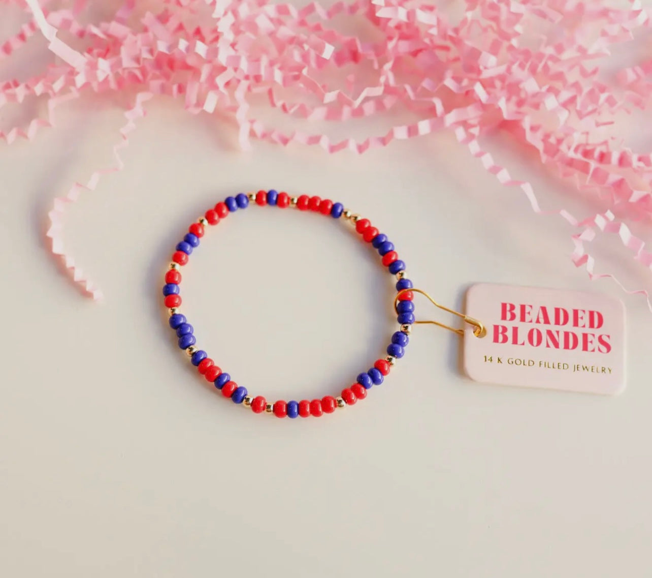 Red and blue beaded blonde