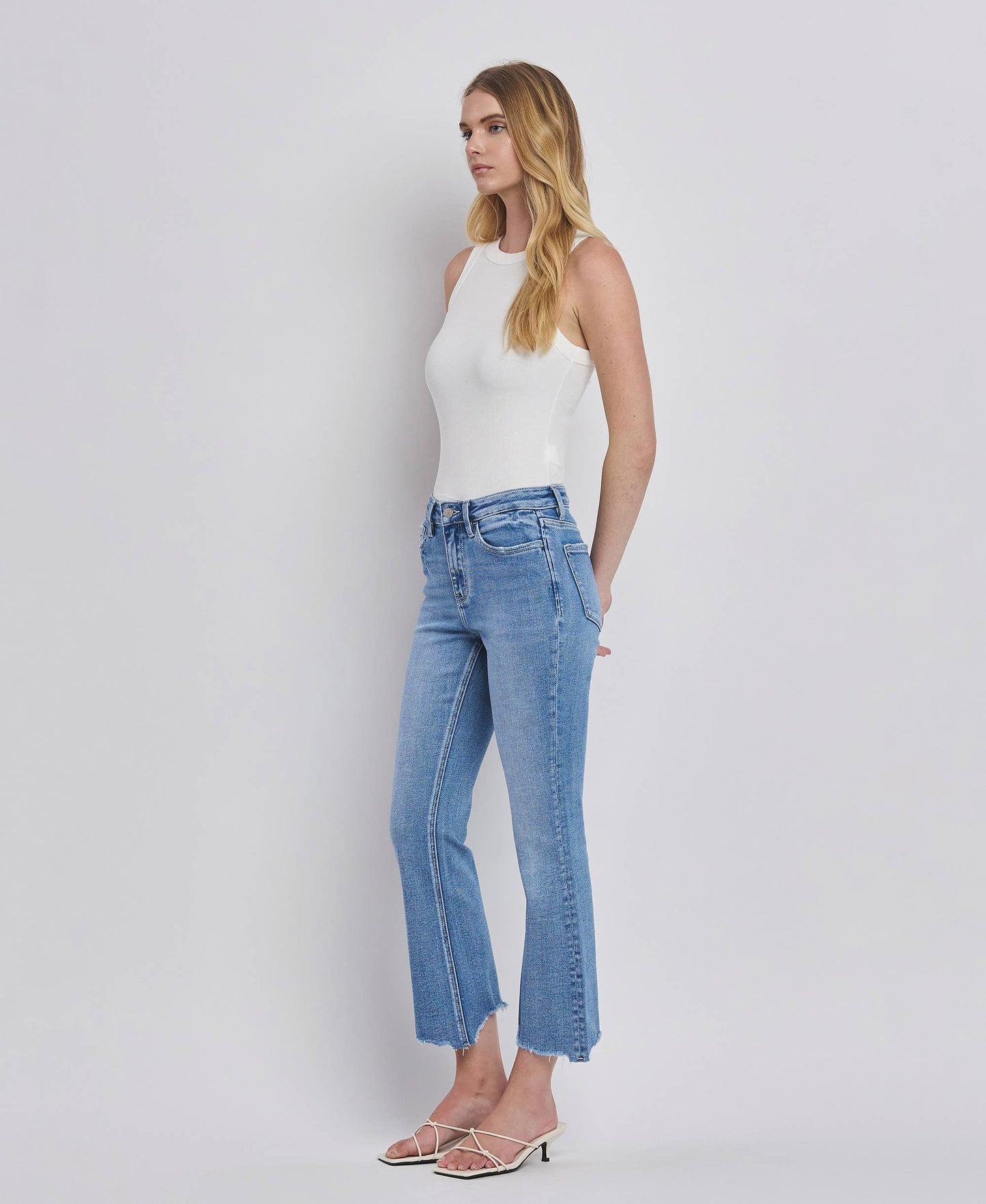 HIGH RISE UNEVEN RAW HEM KICK FLARE JEANS LV1416: PERFECTLY