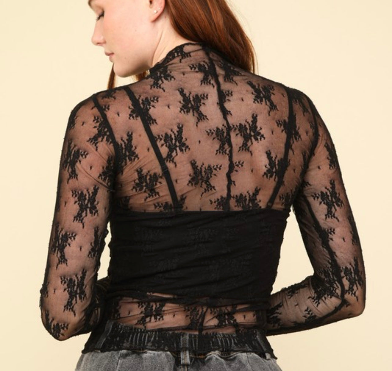 Fitted sheer black floral top