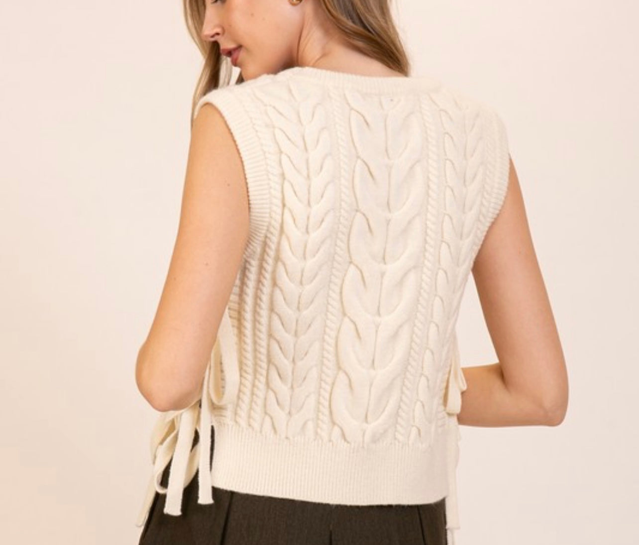 Sleeveless cable knit sweater vest