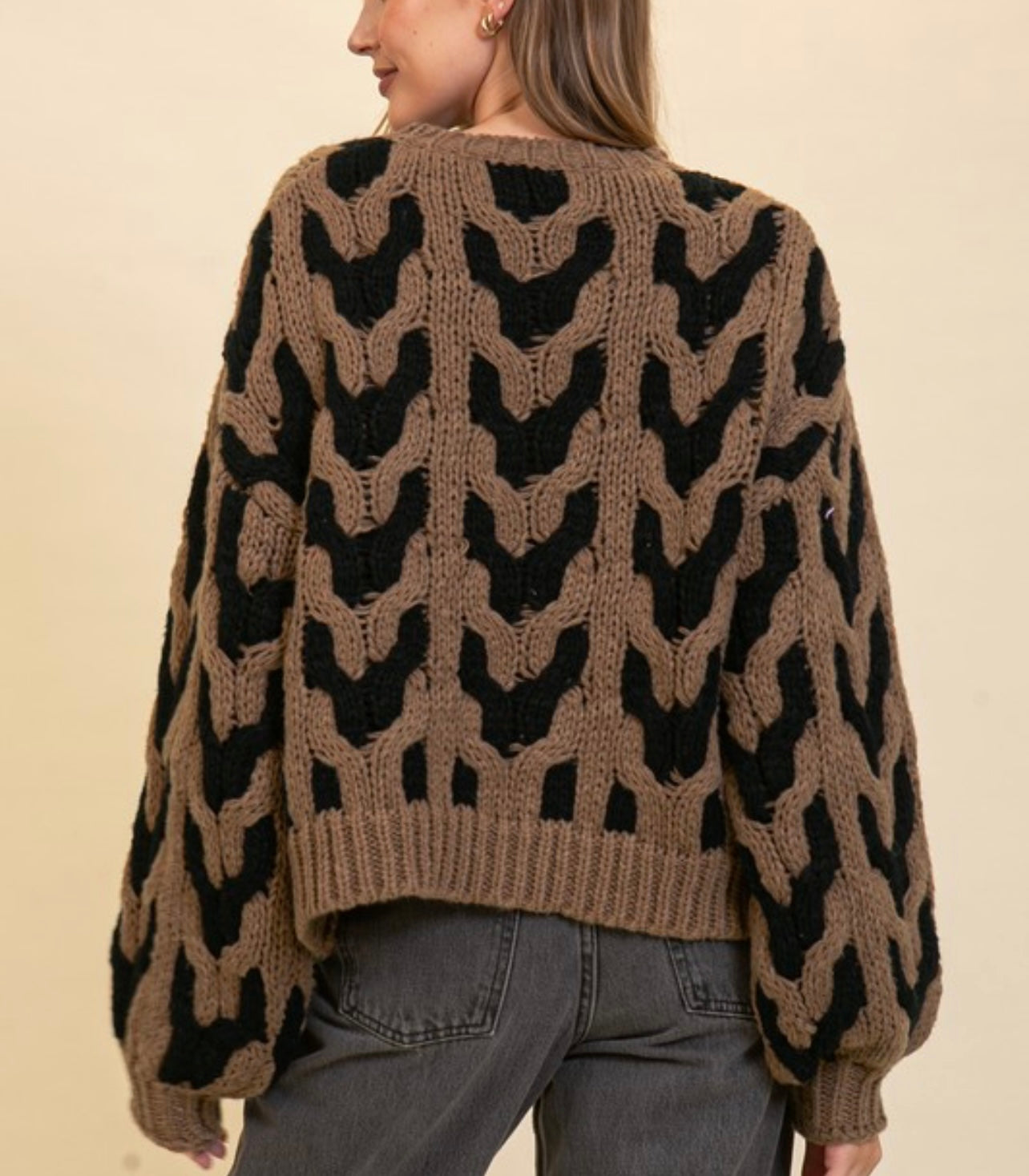 Bold black and brown cable knit sweater