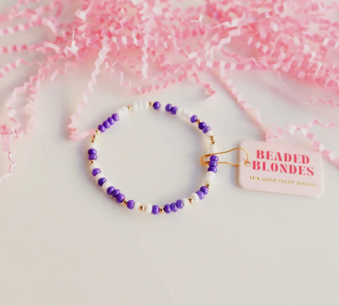 Purple and white beaded blonde