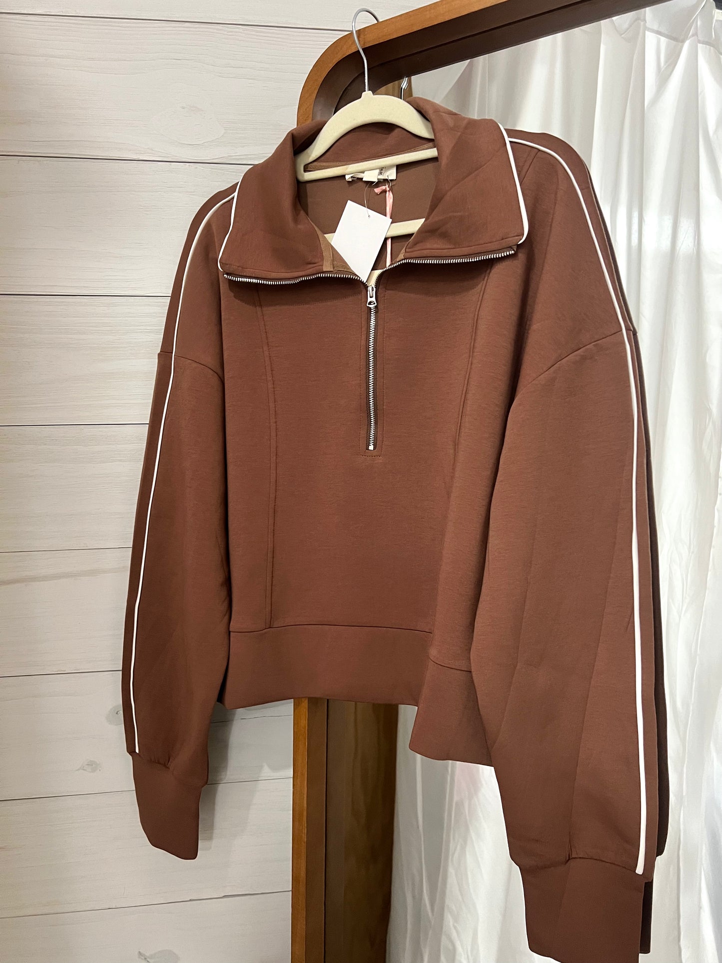 Brown quarter zip with stripe